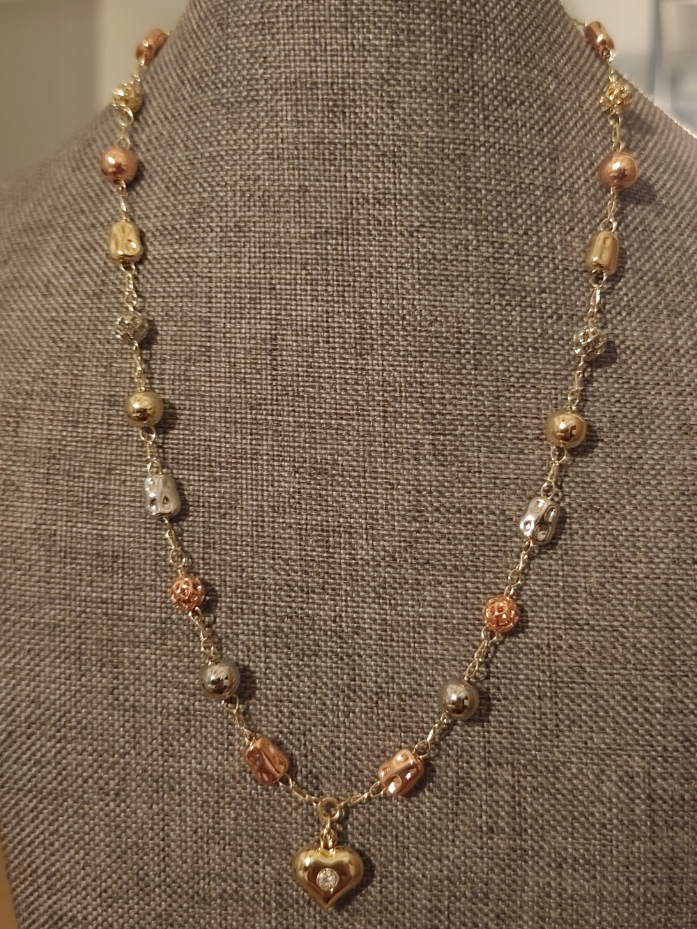 The surface is plated with a thin layer of real gold 14k